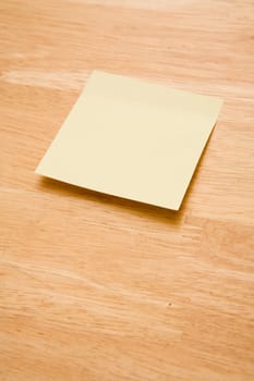 Blank yellow sheet on a table