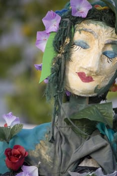 Close view of an handmade puppet recreating a portuguese feminine beauty.