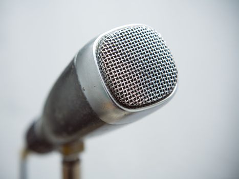 Professional vintage microphone from sixties on a stand