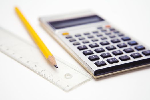 Calculator, pencil and ruler.