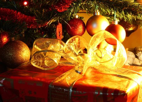 Decorated gift box under the Christmas tree