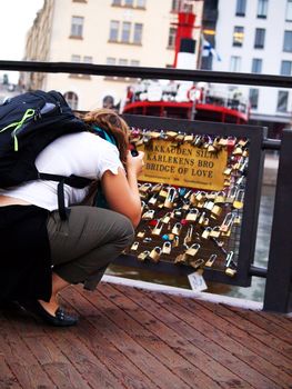 Romantic chain lock bridge in Helsinki Finland