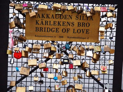 Romantic chain lock bridge in Helsinki Finland