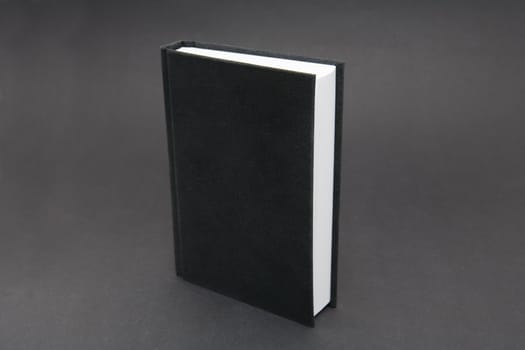 Small black notebook with blank cover