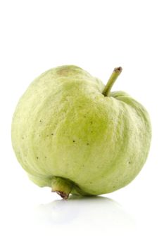 Single organic guava fruit on white background