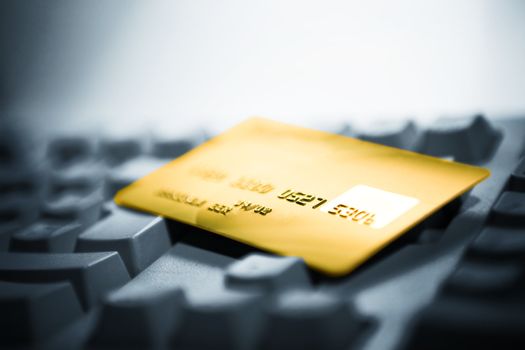 Credit card and computer keyboard. Online shopping.