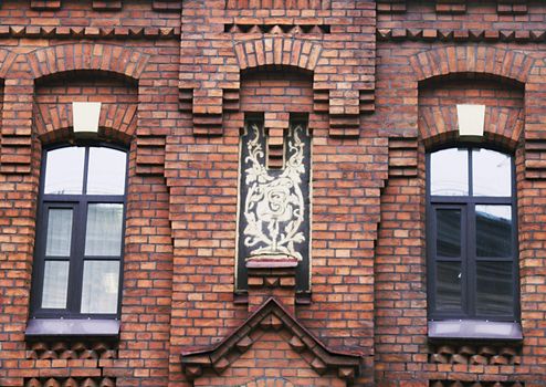 A detail of the brick facade of an old building in Saint Petersburg, Russia.