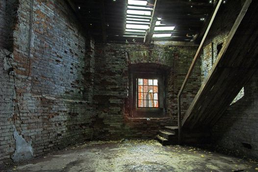 Abandoned store house hall with staircase.