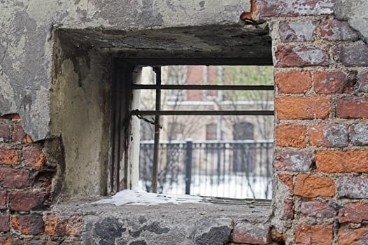 A corroded wall in a back alley.