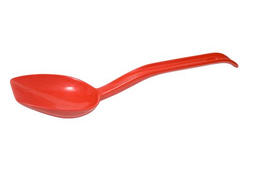 Red plastic ladle isolated on a white background with clipping path