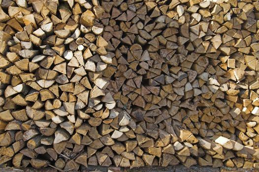 Stack of Firewood Piled By House