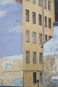 End Side Walls of Old Buildings and a Graffiti picturing flying birds.