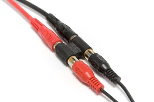 Audio cables with a gender adapter on a white background