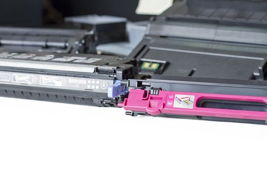 two laser toner cartridge on table