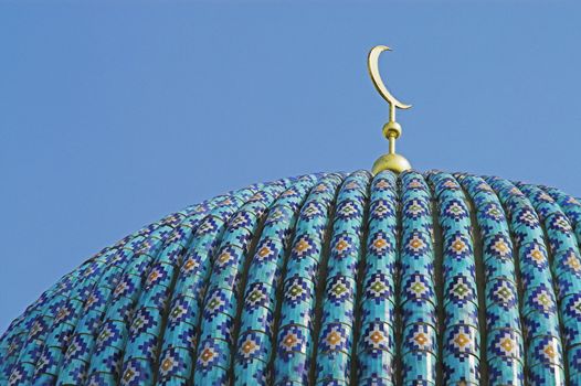 The top of the tiled dome With Arabic mosaics of the ancient mosque in Saint Petersburg, Russia.