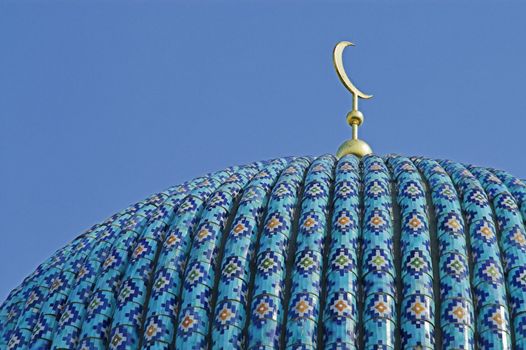 The top of the tiled dome With Arabic mosaics of the ancient mosque in Saint Petersburg, Russia.