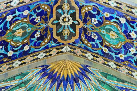 Fragment of tiled wall with Arabic mosaic of ancient mosque in Saint Petersburg, Russia.