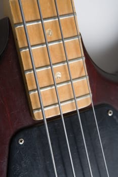 Electric bass guitar with four strings