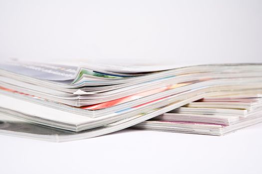 Stack of glossy periodical magazines