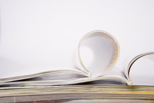 Stack of glossy periodical magazines