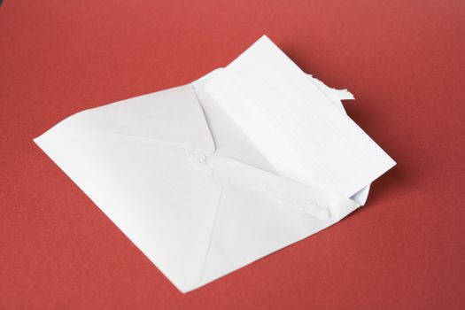 Opened envelope and letter still life photo