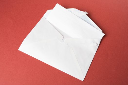 Opened envelope and letter still life photo