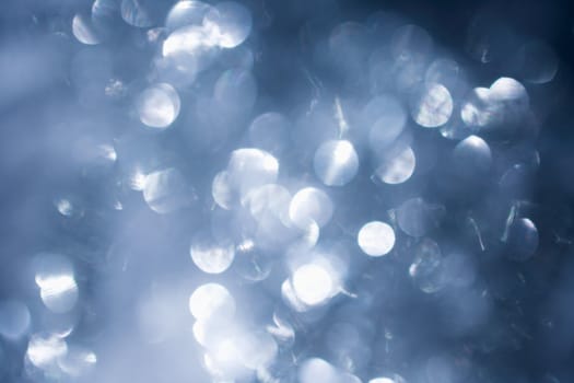 Abstract sparkling blue light background