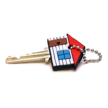 A house key isolated on a white background.