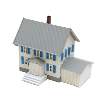 A miniature house isolated on a white background.