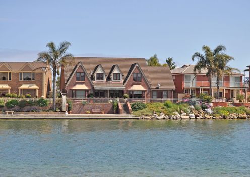 Australian family house, lake view, landscape. Houses on the lake. Houses with water view