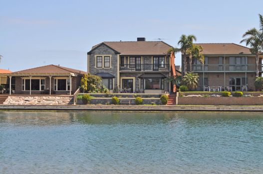 Australian family house, lake view, landscape. Houses on the lake. Houses with water view