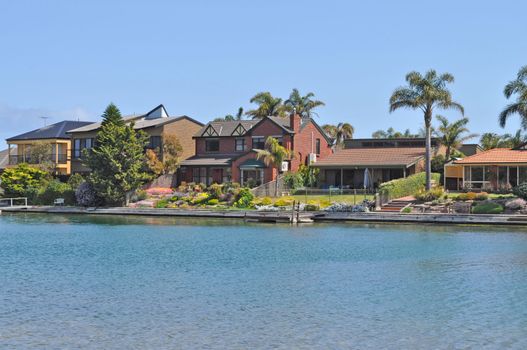 Australian family house, lake view, landscape. Houses on the lake. Houses with water view