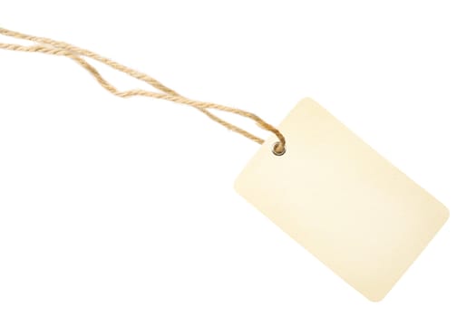 Blank beige tag with cotton string on white background