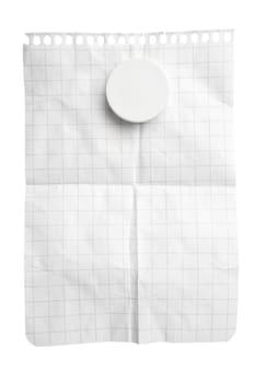 Single sheet of squared notepad paper with magnet isolated on white with clipping path