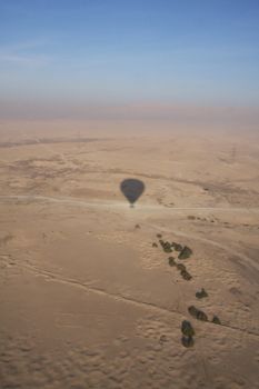 Hot air ballooning over the desert Luxor Egypt, aerial shot