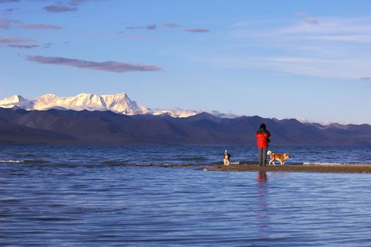 Landscape of blue lake and snow mountains in Tibet