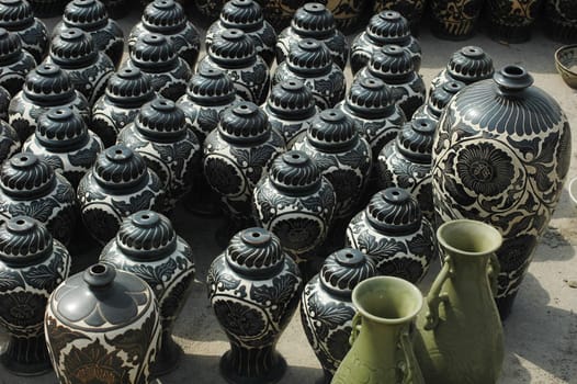 Piles of pottery Jugs and Vases in China