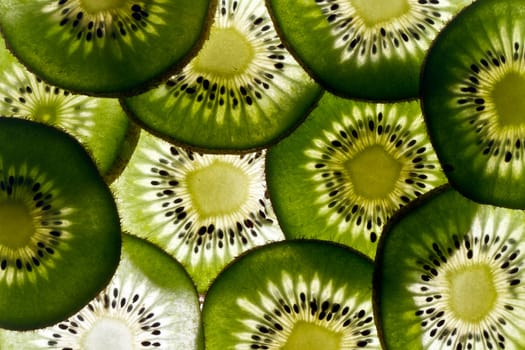 Many slices of fresh green kiwi fruit