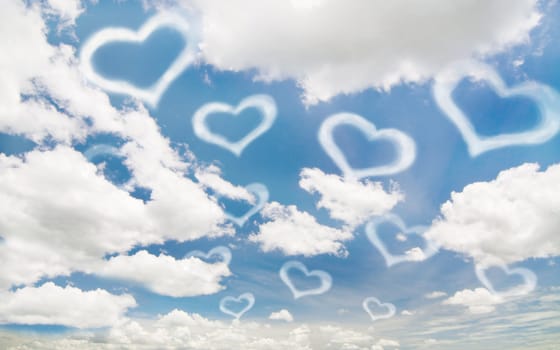 white heart on the blue sky and cloudy