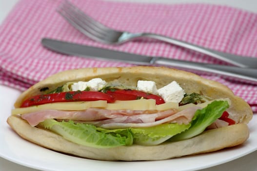 A delicious sandwich, bursting with fresh, healthy ingredients