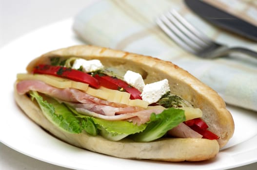 A delicious sandwich, bursting with fresh, healthy ingredients