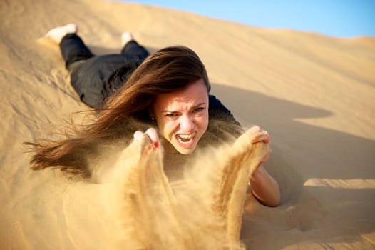 Woman enjoying the desert in Dubai, United Arab Emirates