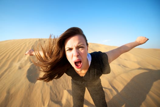 Woman enjoying the desert in Dubai, United Arab Emirates