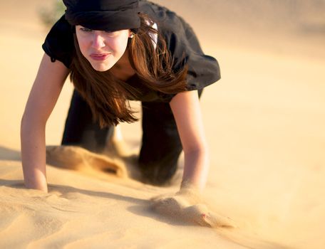 Woman enjoying the desert in Dubai, United Arab Emirates