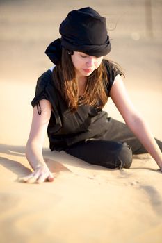 Woman enjoying the desert in Dubai, United Arab Emirates