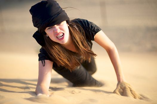 Woman enjoying the desert in Dubai, United Arab Emirates