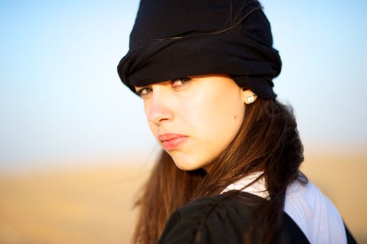 Woman enjoying the desert in Dubai, United Arab Emirates