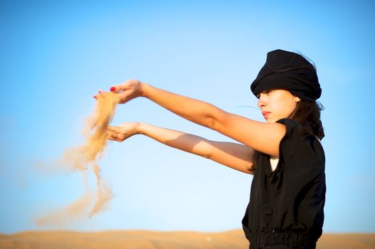 Woman enjoying the desert in Dubai, United Arab Emirates