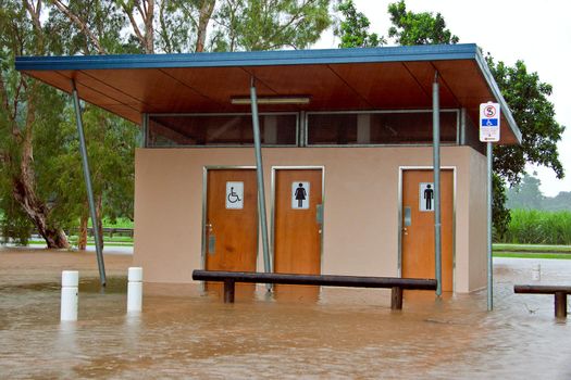 Public toilets and bathrooms flooded after heavy rain and flooding in Queensland, Australia