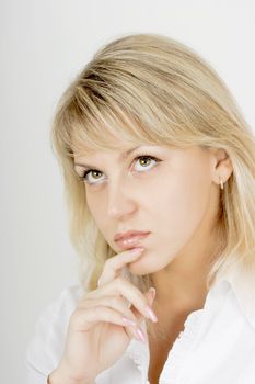 portrait of a pensive girl attractive blonde with hazel eyes
